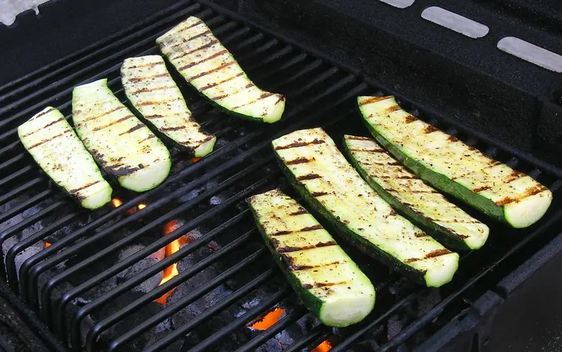 Grilled zucchini, the zucchini was picked 15 minutes earlier, brushed with olive oil, sprinkled with salt and pepper, and tossed onto the grill until just barely soft.