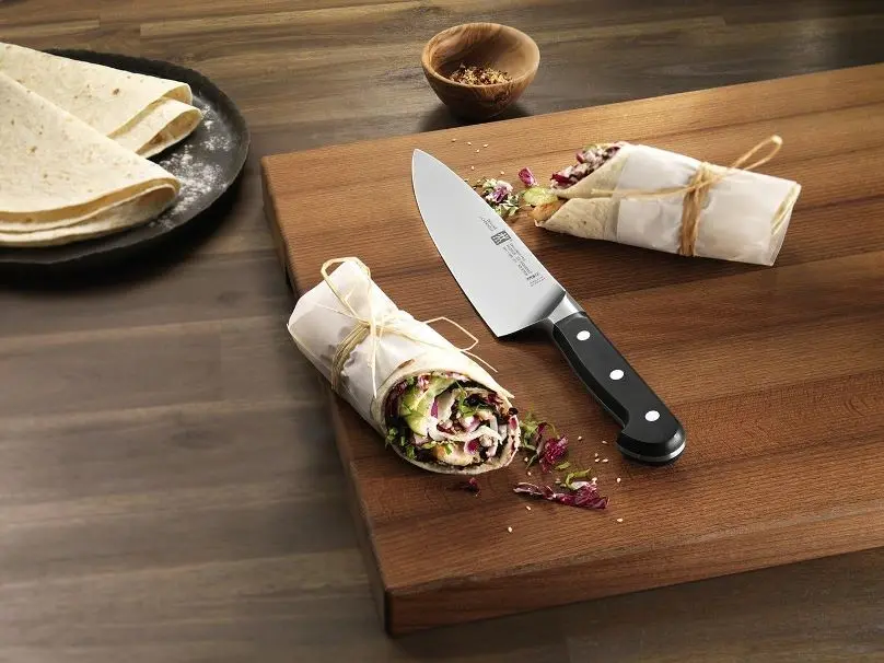 Chefs Knife on a chopping board